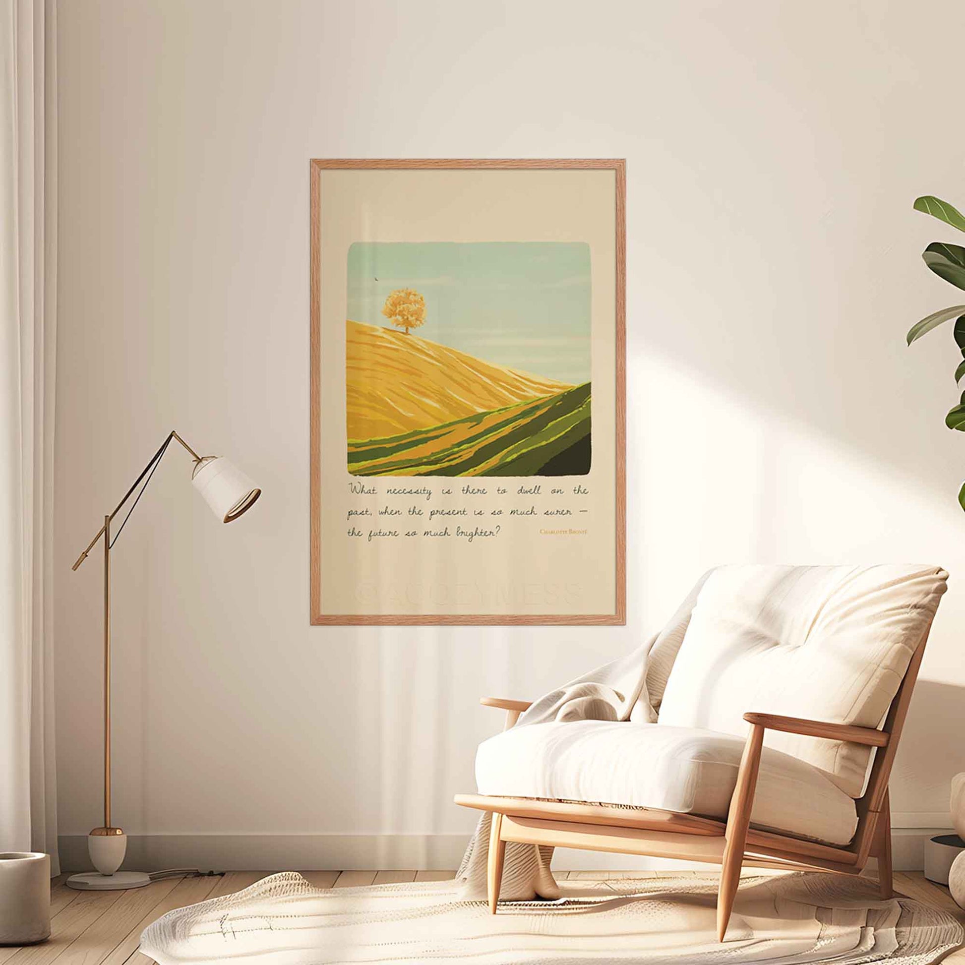  A landscape wall art print featuring an inspiring quote by Charlotte Brontë, the art includes a calming illustration of a bright mountain landscape, symbolizing optimism, growth, and a forward-looking mindset, displayed in oakwood frame.