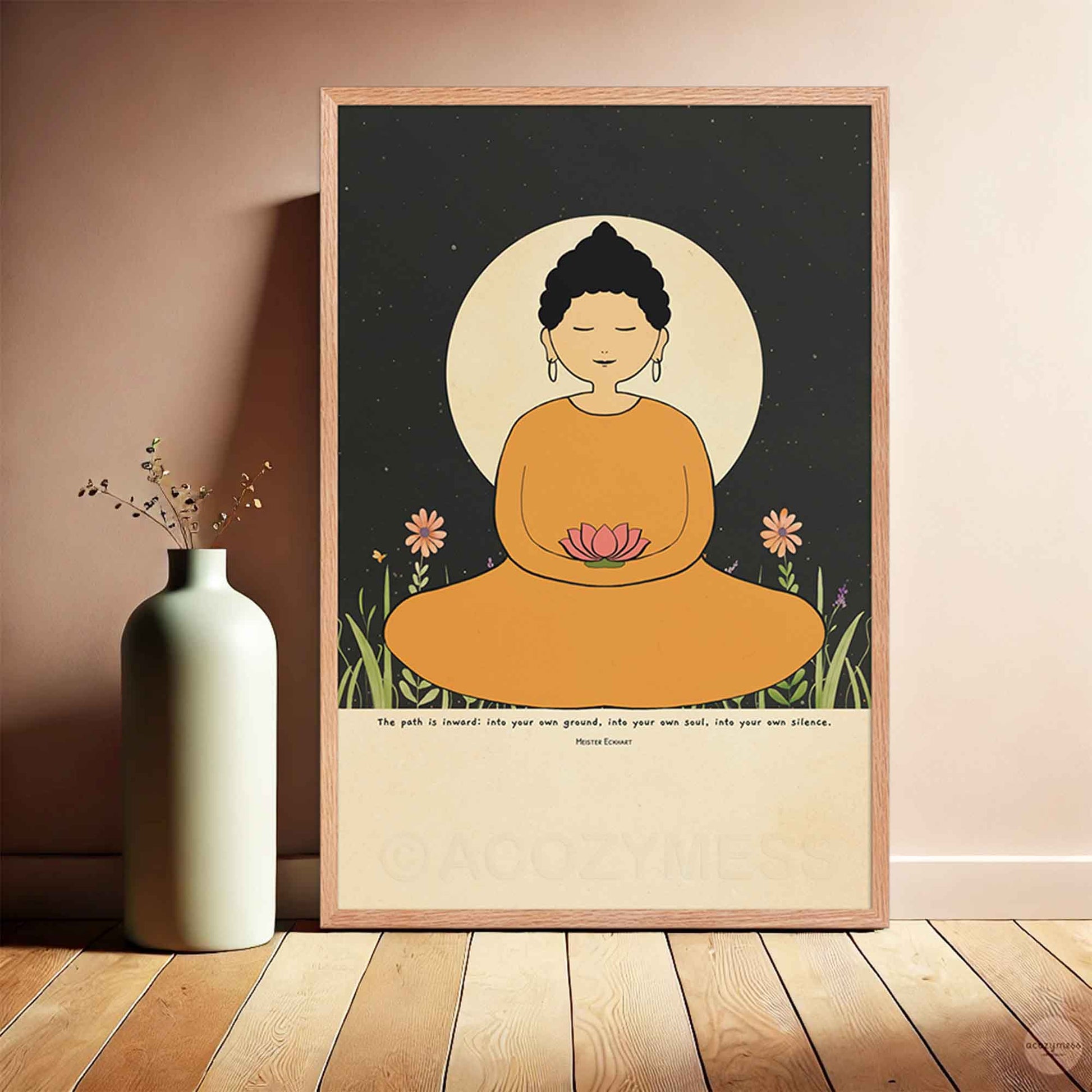  A spiritual wall art poster featuring a woman Buddha in a yellow robe meditating, holding a lotus flower. She is seated before a large glowing moon with a starry night sky in the background. The poster includes the quote by Meister Eckhart in oakwood frame.