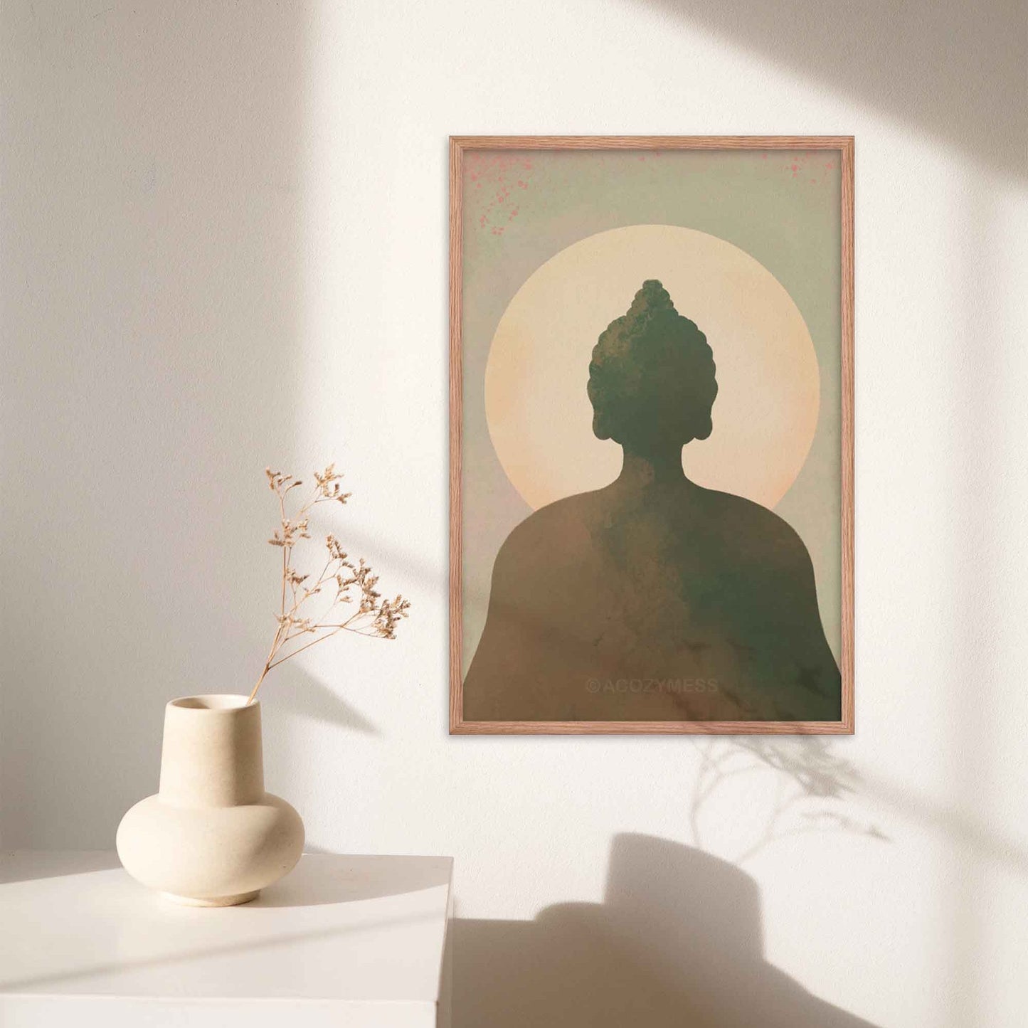 Buddha wall art in earthy tones of blue, green, brown, and beige, designed to bring tranquility and spiritual serenity to any space, in oakwood frame.