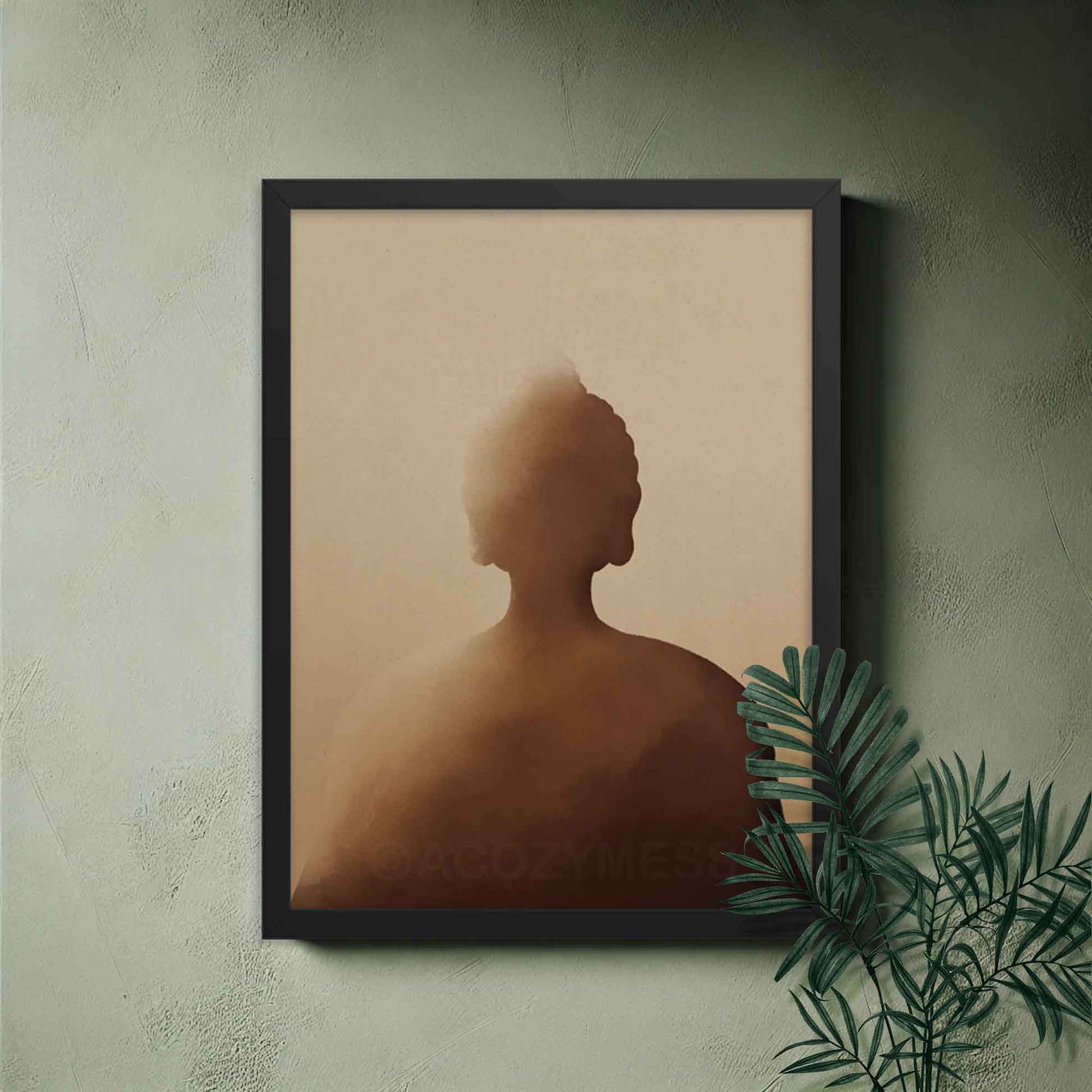 Buddha wall art in deep shades of earthy brown hues art print in black frame.