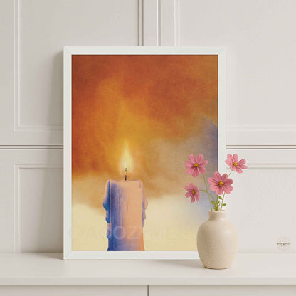 White framed candle wall art in warm colors.