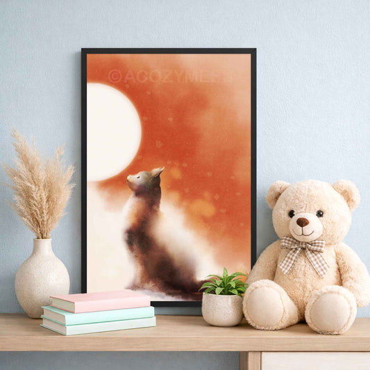 Black framed cat and moon art poster featuring a cat gazing at the moon in warm white, orange, and brown tones displayed in nursery