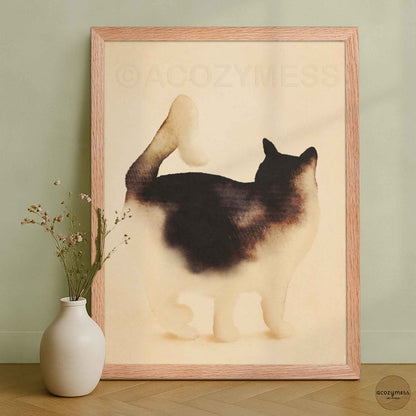 Natural wood framed minimalist cat art print against a sage green wall with a white vase