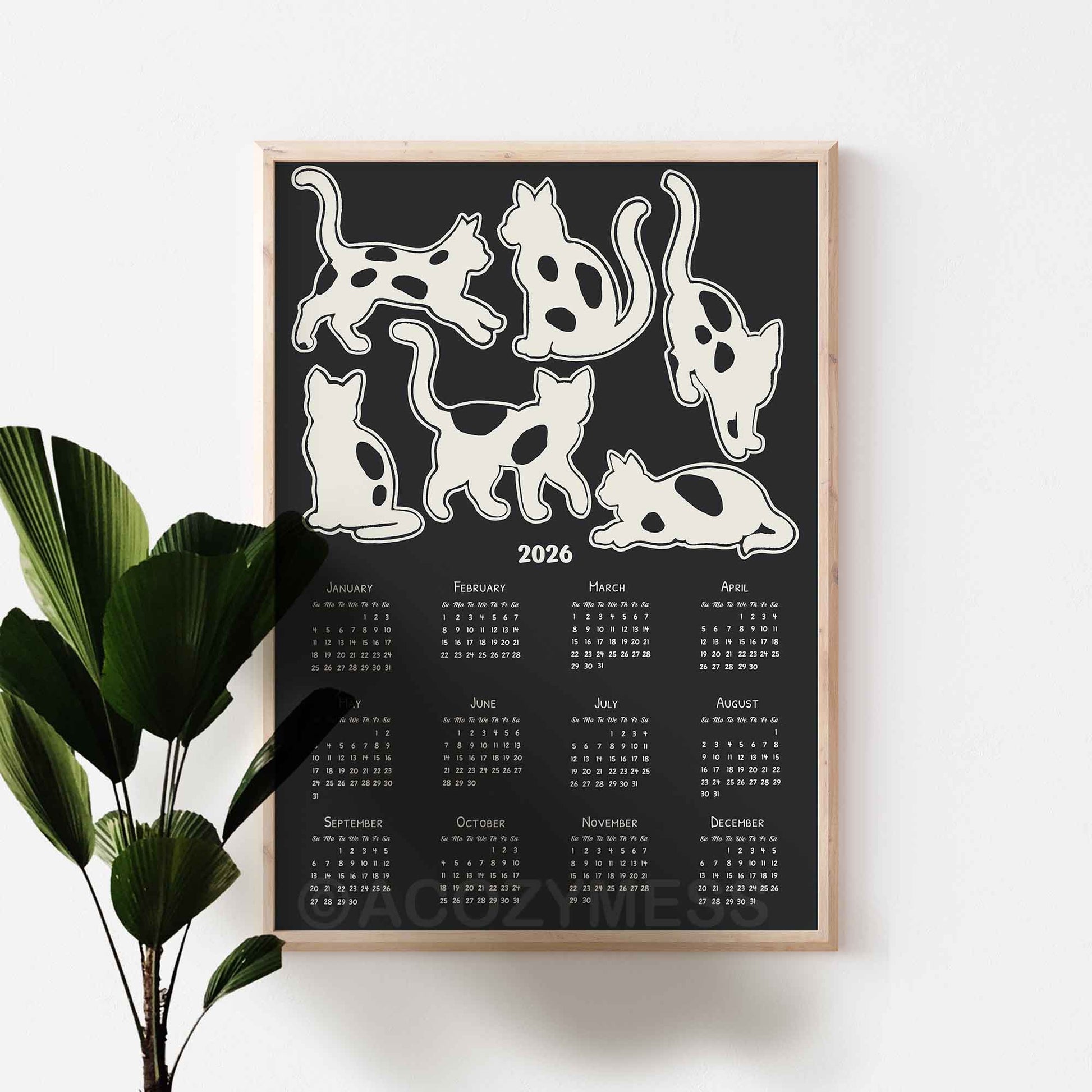 2026 calendar with cat illustrations on a black background
