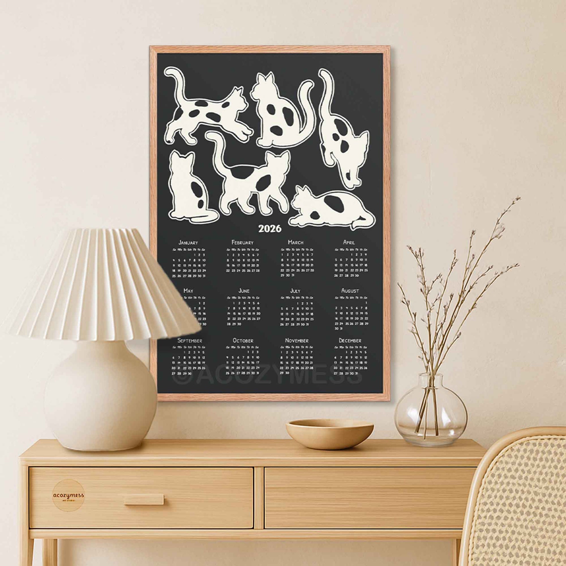 2026 calendar with cats art on a black background