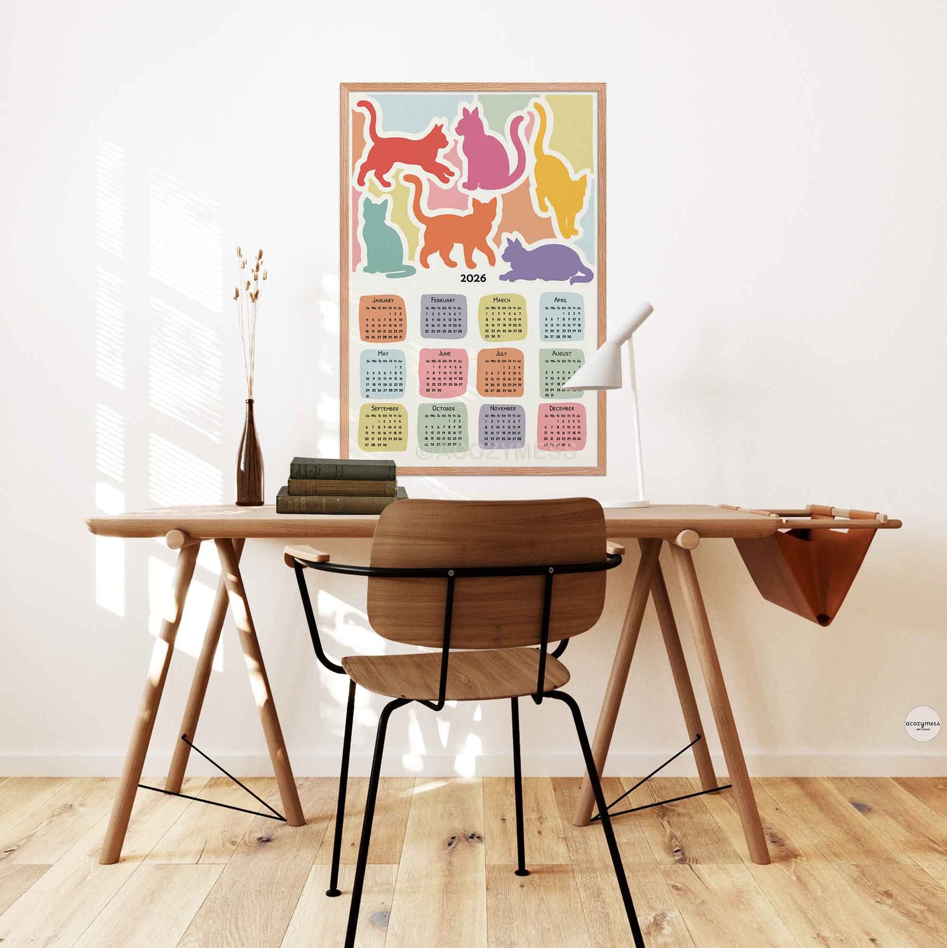 colorful cat-themed wall calendar.
