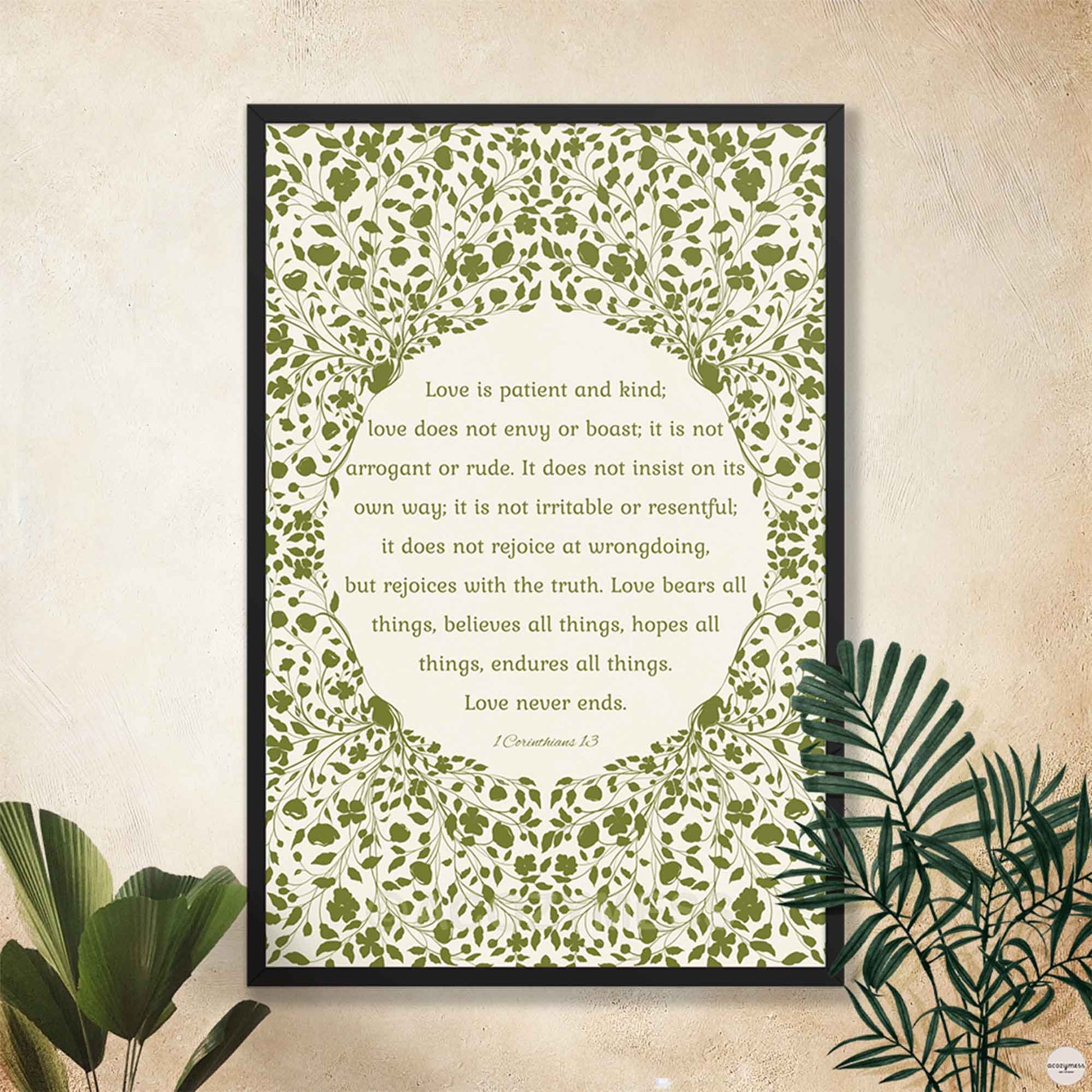 Faith-based wall art in a sleek black frame with green floral design and scripture quote on a soft beige background—ideal for modern decor.