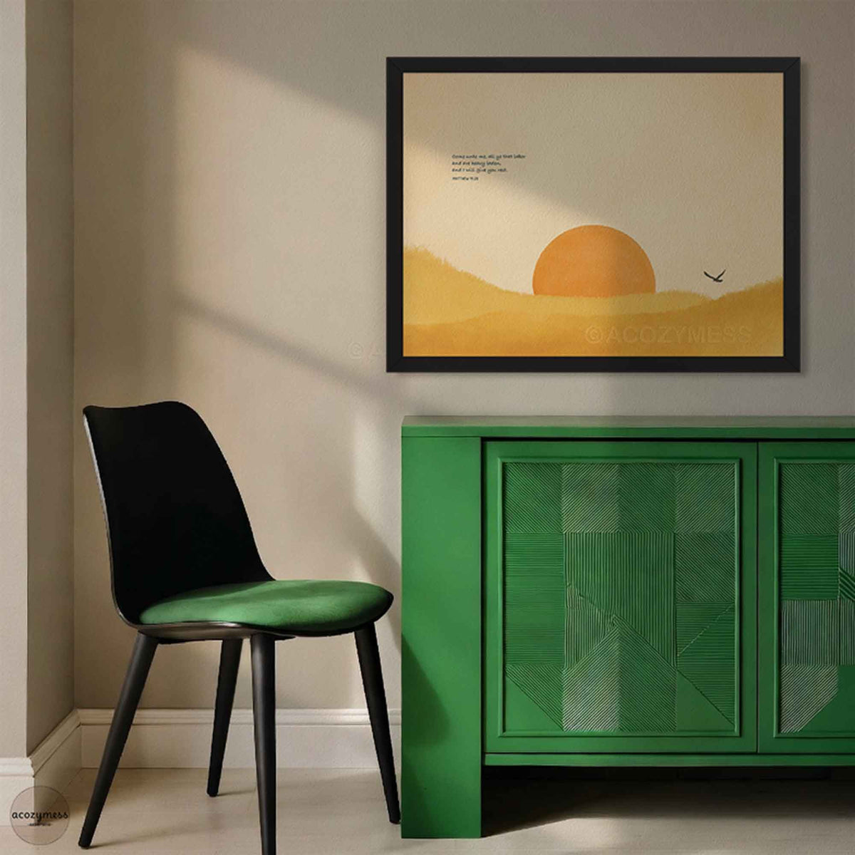 Black framed Come Unto Me Matthew 11:28 poster above a green cabinet and a black chair with a green seat