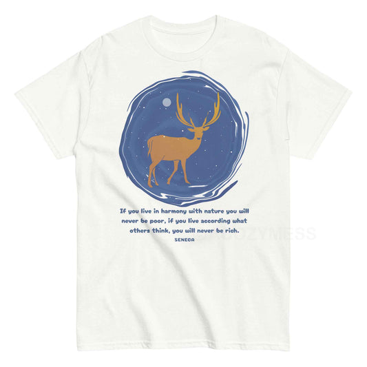  A white T-shirt featuring a minimalist design of a majestic deer standing under a starry night sky, accompanied by a quote from Seneca: If you live in harmony with nature, you will never be poor. If you live according to what others think, you will never be rich.