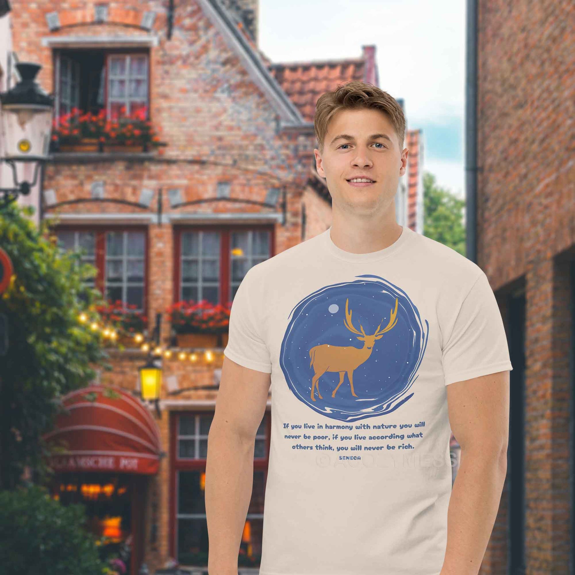  A natural color  T-shirt featuring a minimalist design of a majestic deer standing under a starry night sky, accompanied by a quote from Seneca: If you live in harmony with nature, you will never be poor. If you live according to what others think, you will never be rich.