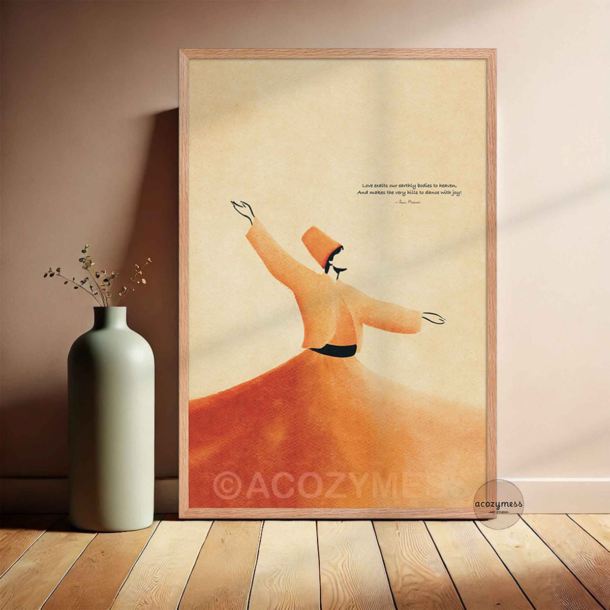 Rumi whirling dervish quote art poster in a light oak frame leaning against a warm beige wall beside a sage green vase