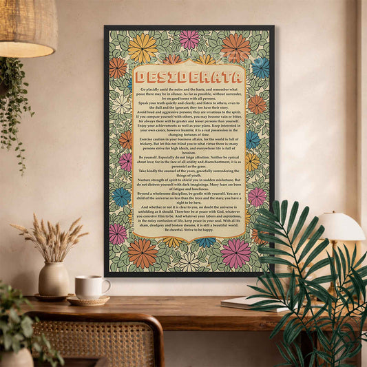 Desiderata Poem with floral poster displayed above a study desk in sleek black frame.