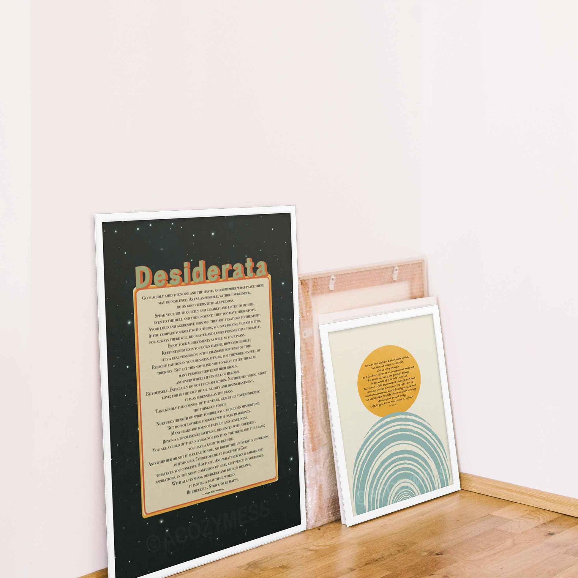 Desiderata poem print in beige, black, green and orange colors, in white frame.