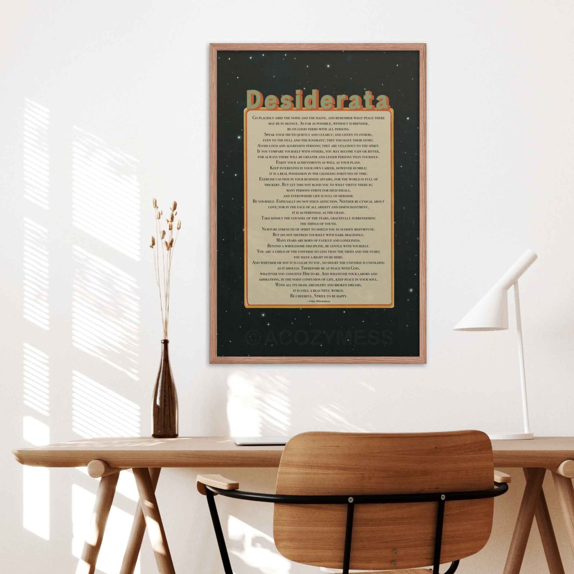 Desiderata poem print in beige, black, green and orange colors, in oakwood frame.