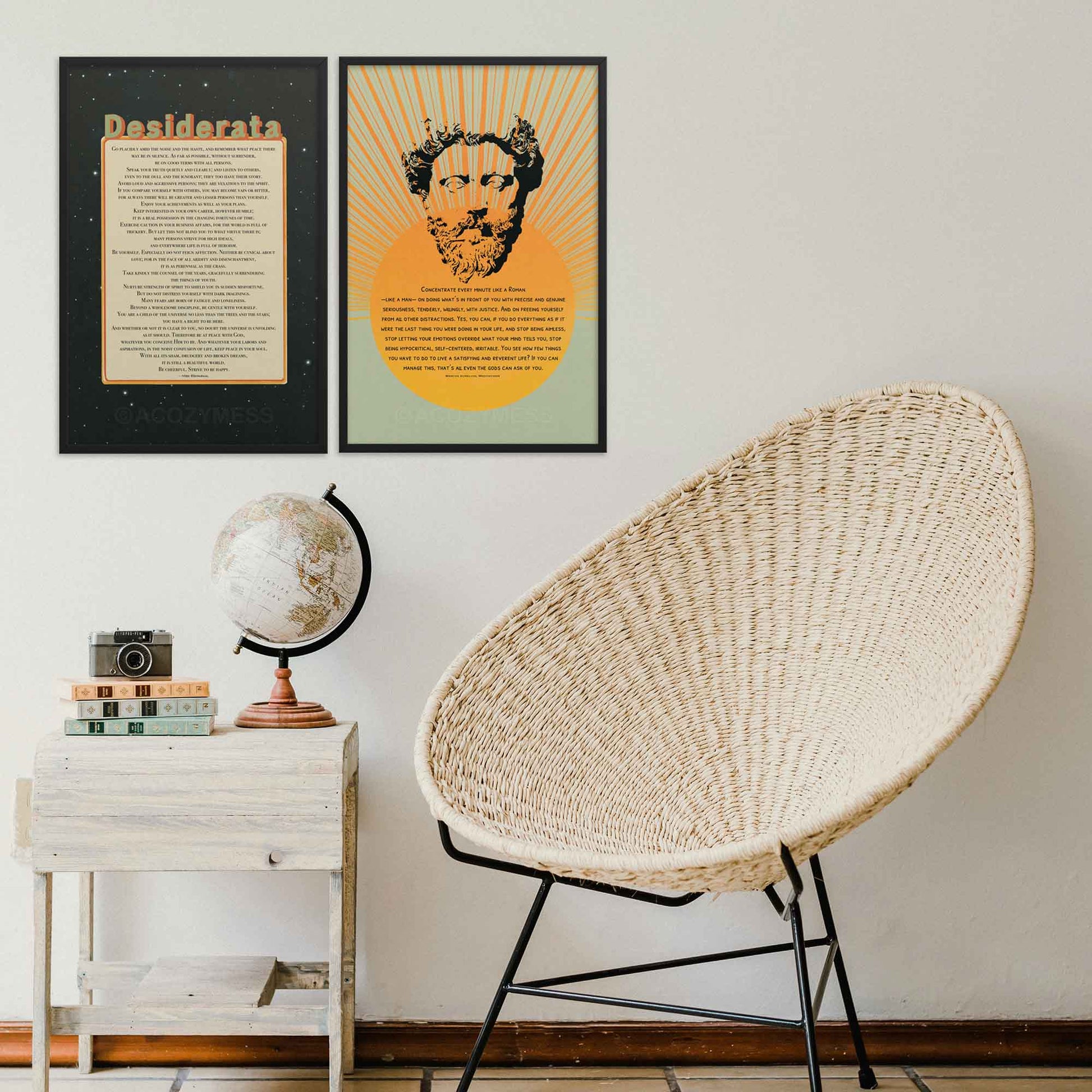 Desiderata poem print in beige, black, green and orange colors, in black frame. And Marcus Aurelius poster in black frame.