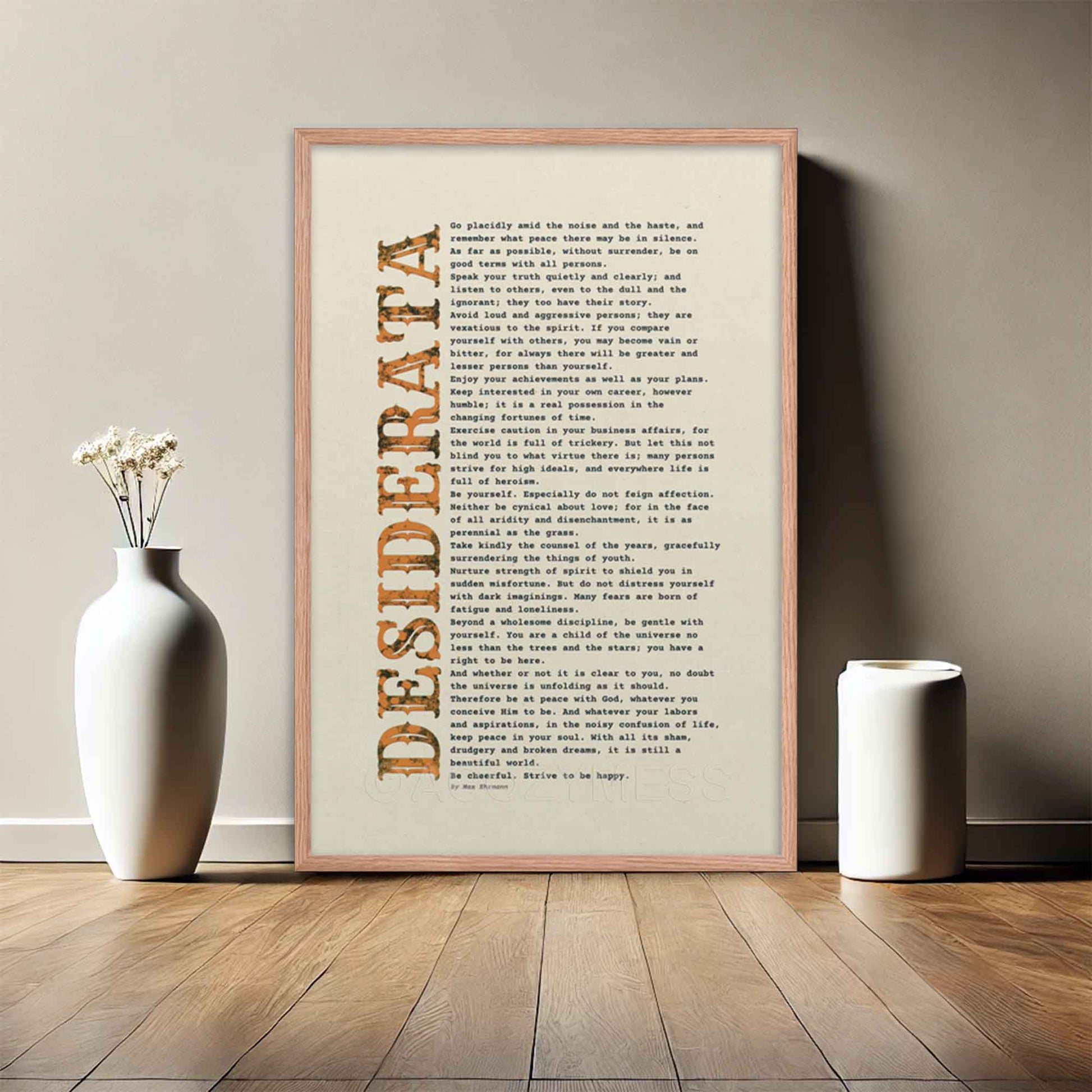 desiderata Poem Poster black and orange on beige, displayed in oakwood frame.