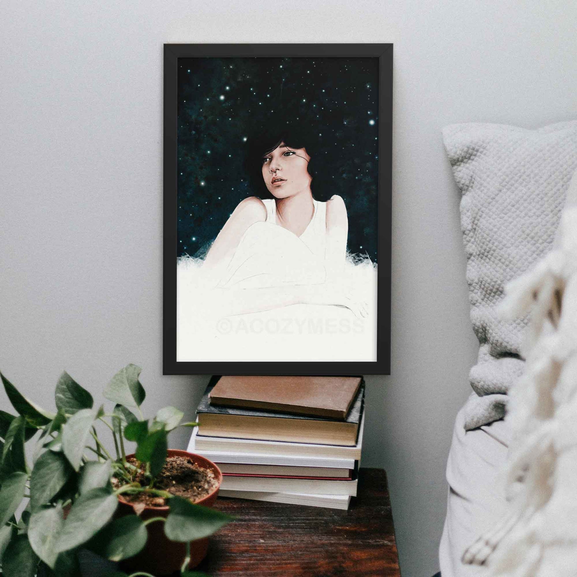 Girl Dreaming Awake at Night art print, created with a soothing blue, white, and pink palette using watercolors and iPad, perfect for adding a dreamy, tranquil vibe to your bedroom  wall in black frame.