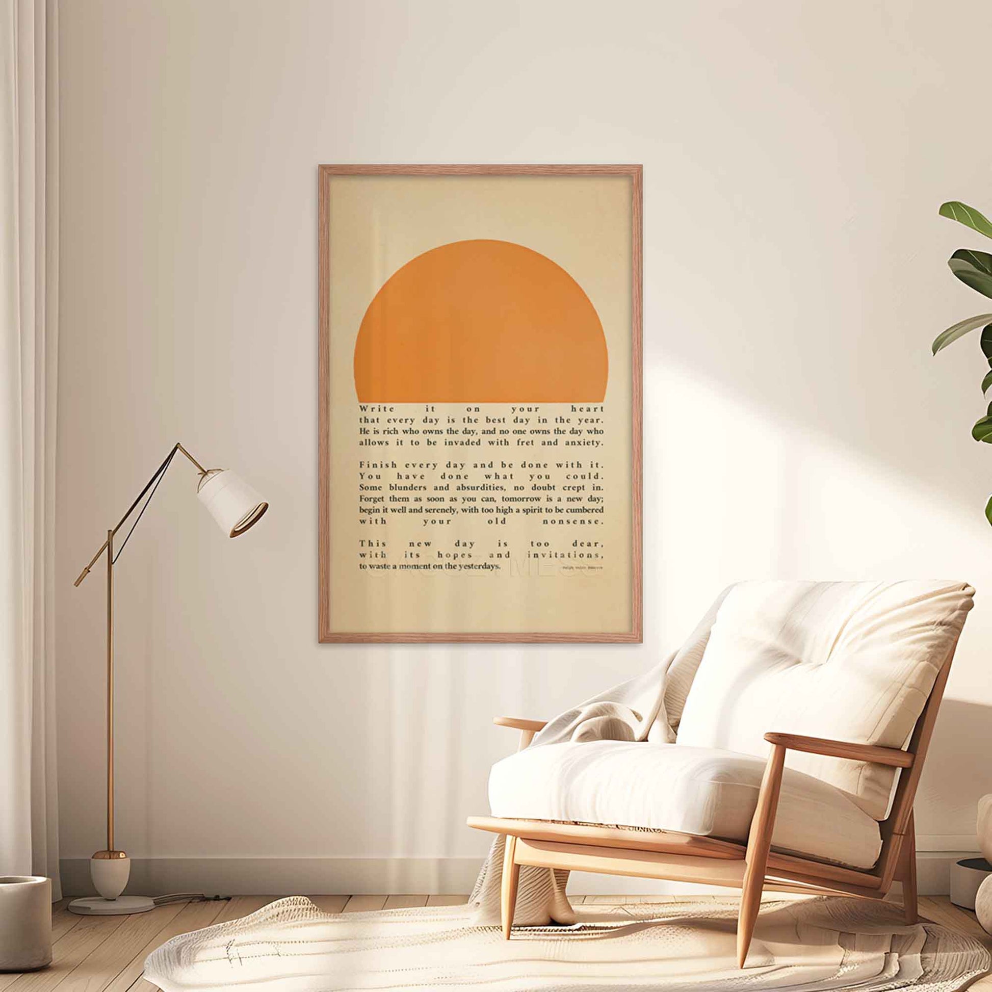 Poster featuring Ralph Waldo Emerson's inspirational quote, Write it on your heart..., with a warm sun illustration, displayed in a oakwood frame on a living room wall.