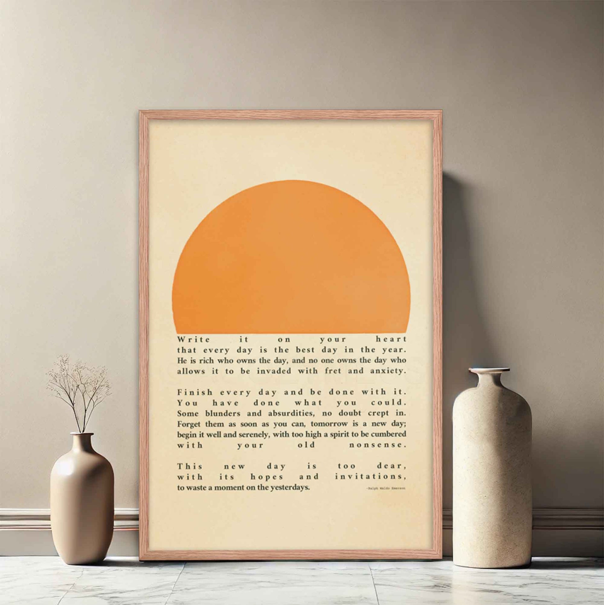 Poster featuring Ralph Waldo Emerson's inspirational quote 'Write it on your heart...' with a warm sun illustration, displayed in a oakwood frame.