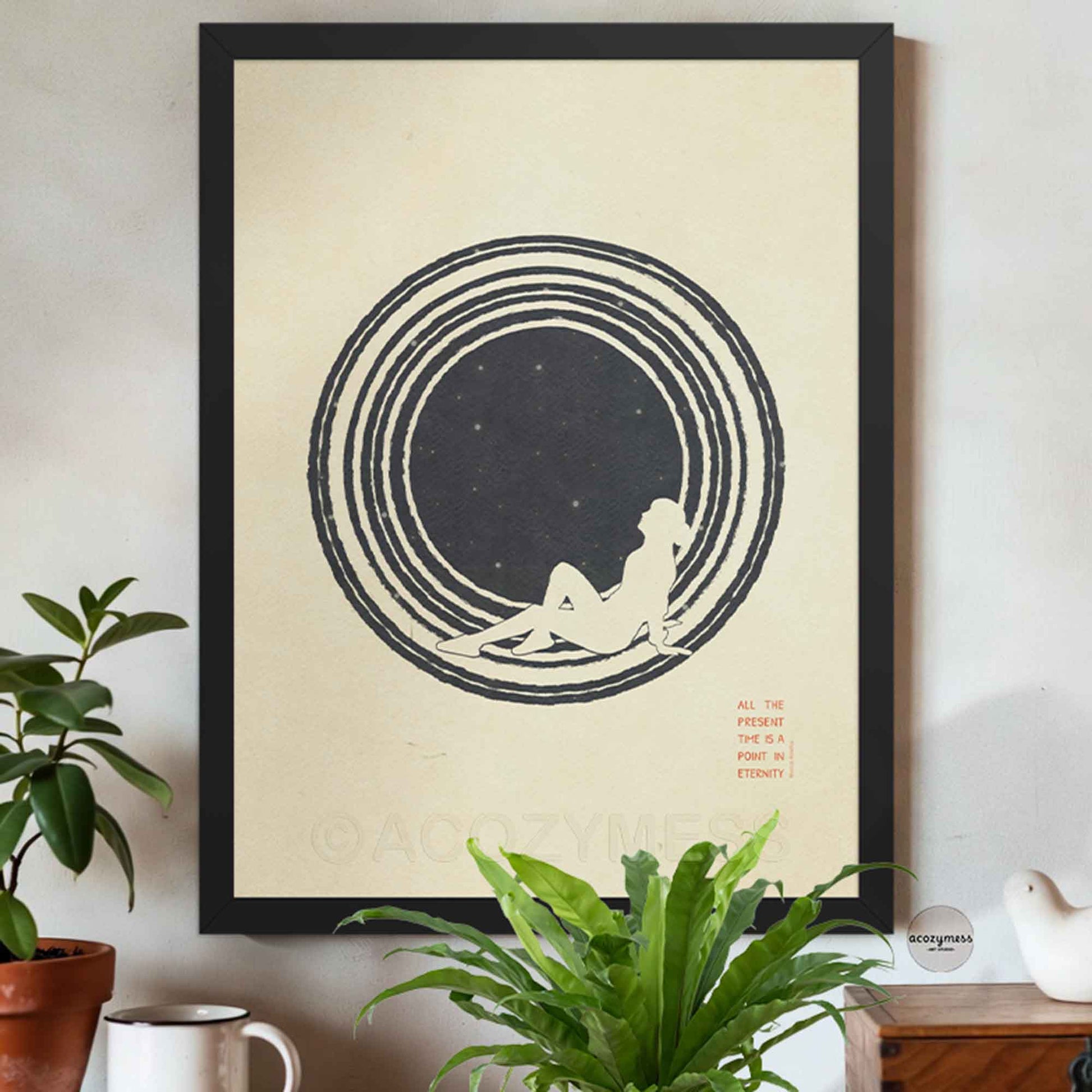 An black framed  minimalist philosophy poster featuring a clean illustration of a lone figure stargazing beneath a vast, starry sky. The artwork is framed in a sleek border, displaying sharp typography with the Marcus Aurelius quote hanging on a wall.