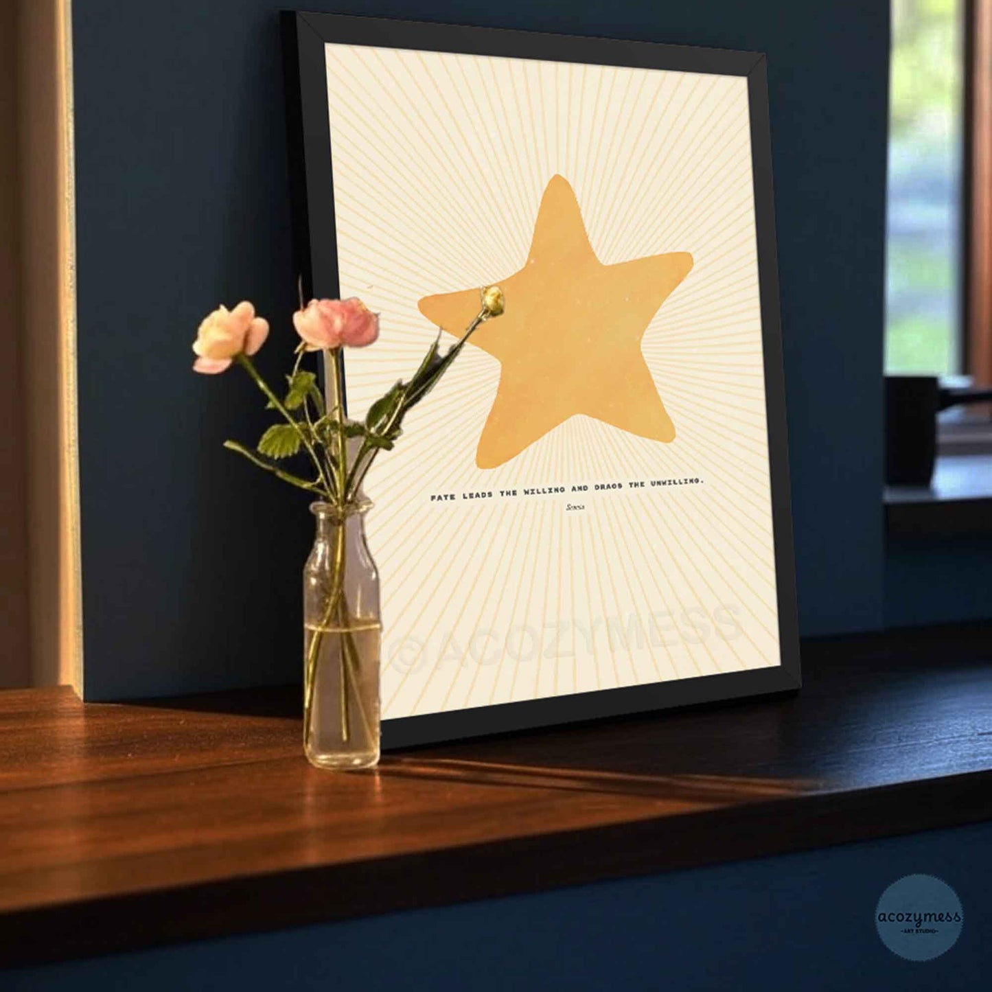 Stoic philosophy wall art featuring Seneca’s quote with bright star illustration, shown in a sleek black frame for a bold, modern look.