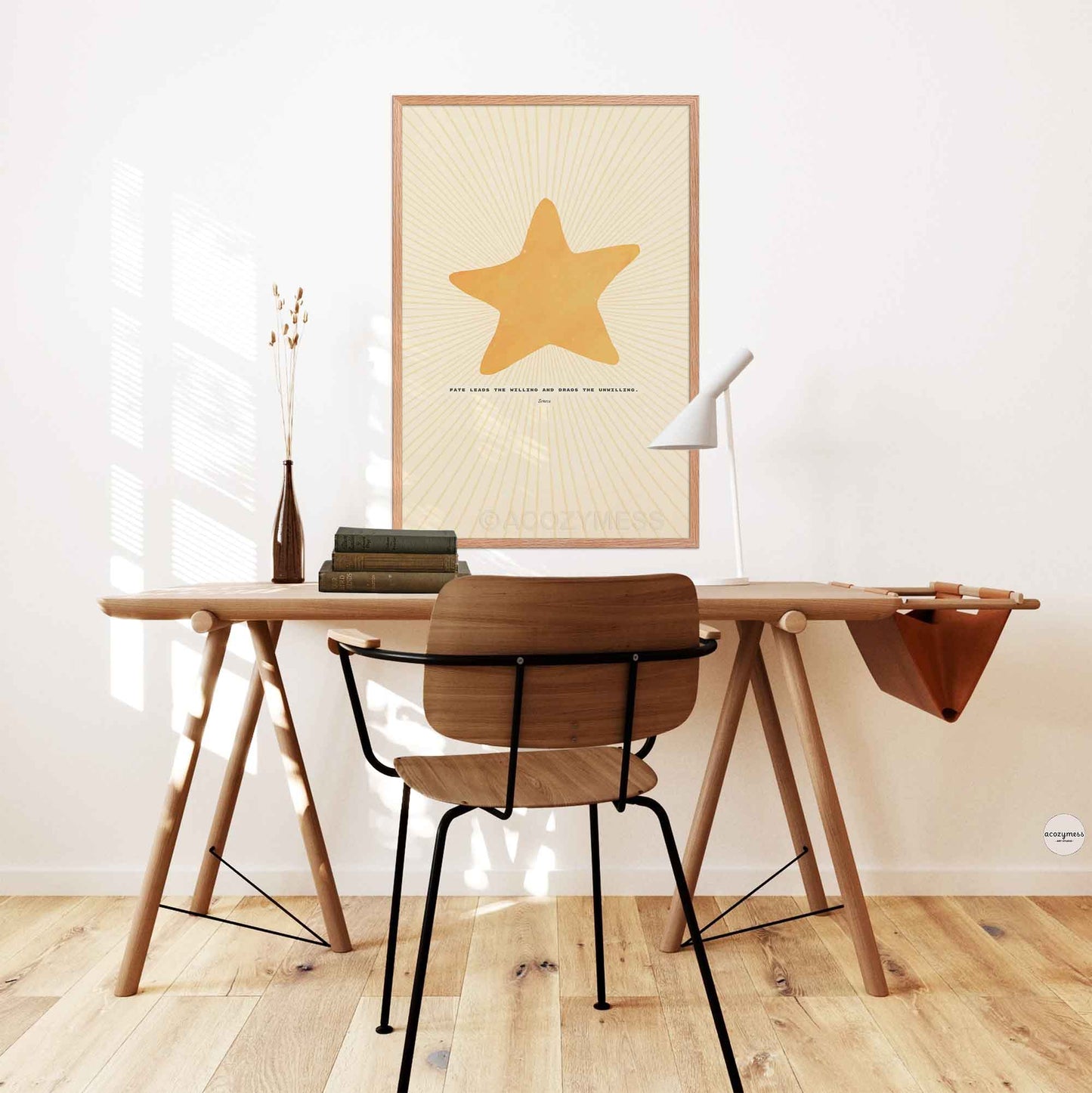 Seneca on fate quote poster with bright star illustration displayed in an oakwood frame, warm and natural finish in office or study room wall