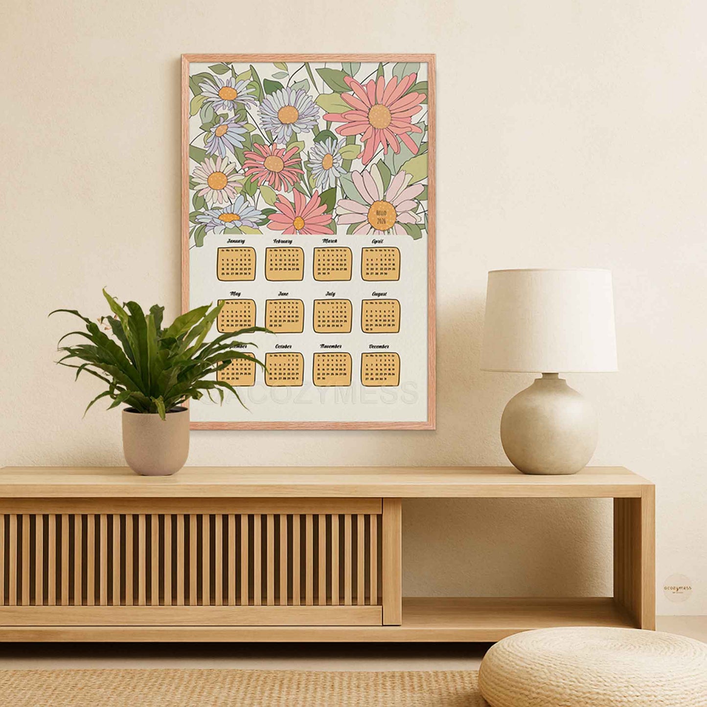 Framed floral calendar on a wall with floral art