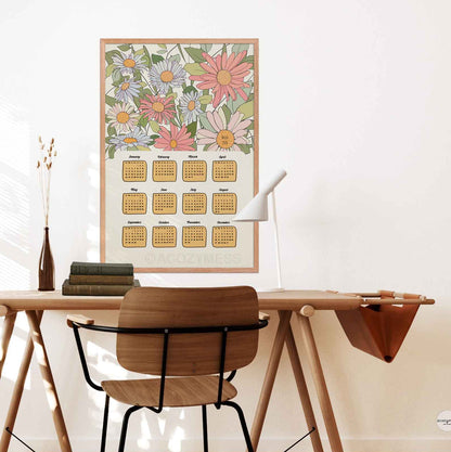 2026 calendar floral design displayed on a office wall above desk