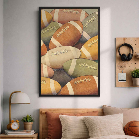 Framed artwork of colorful footballs on a wall above a bed in a bedroom.