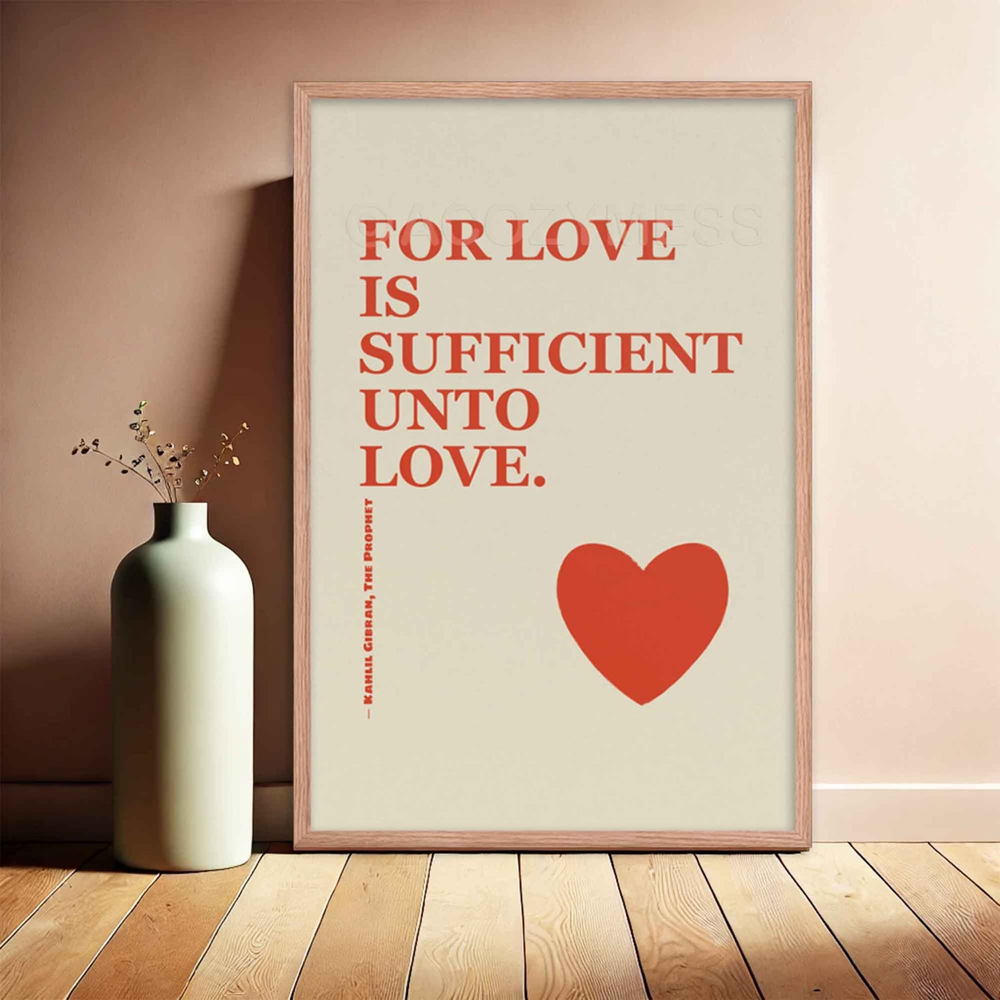 Kahlil Gibran poster with quote on love, red on beige with heart design, displayed in oakwood frame.