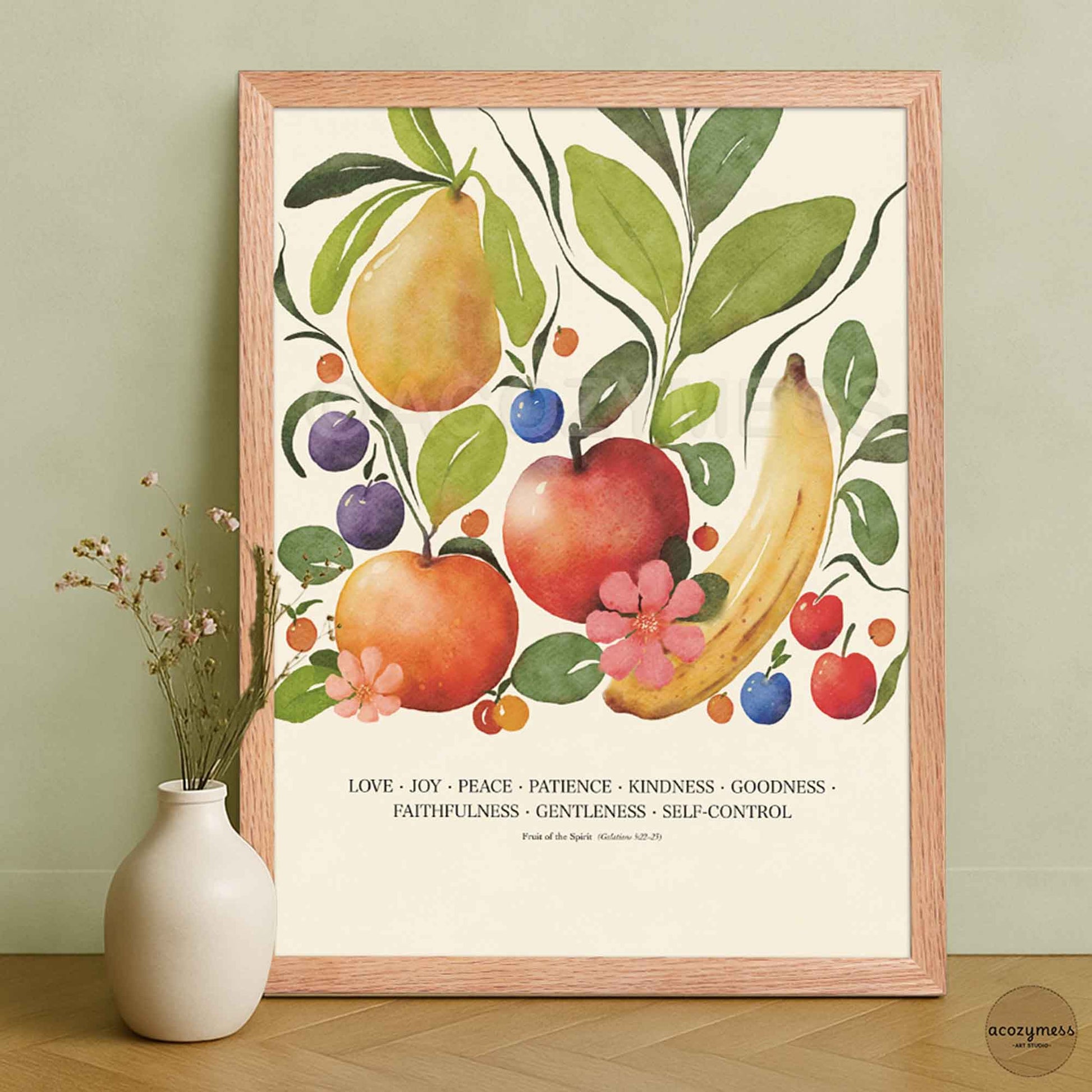 Fruit of the Spirit wall art displayed in an oakwood frame, featuring vibrant fruit illustrations and scripture-inspired text on beige.