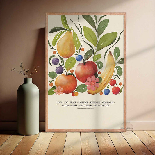 Fruit of the Spirit wall art displayed in an oakwood frame, featuring vibrant fruit illustrations and scripture verse.