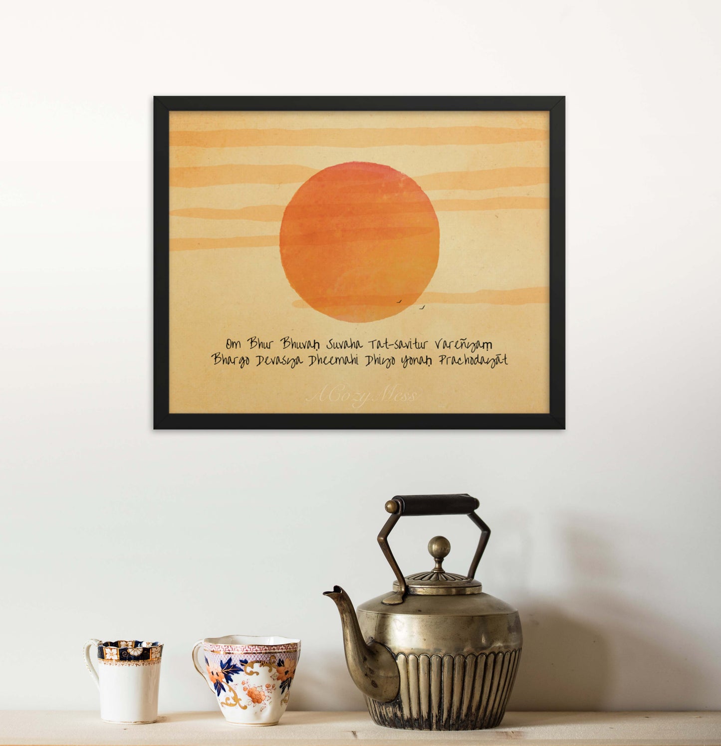 A wall art print featuring the Gayatri Mantra overlaid on a radiant sunburst, creating a spiritually uplifting and visually captivating artwork in black frame.