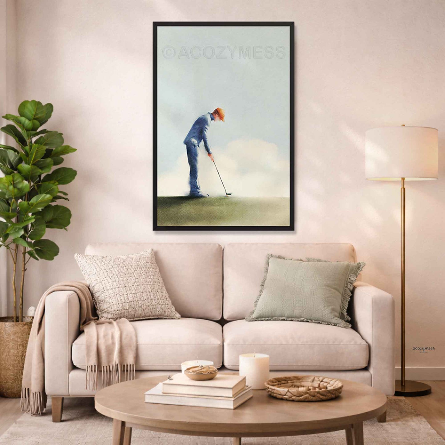 Living room with  a framed picture of a golfer on the wall.