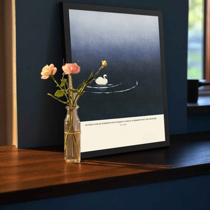 Marcus Aurelius poster displayed in a black frame, featuring tranquil blue artwork.