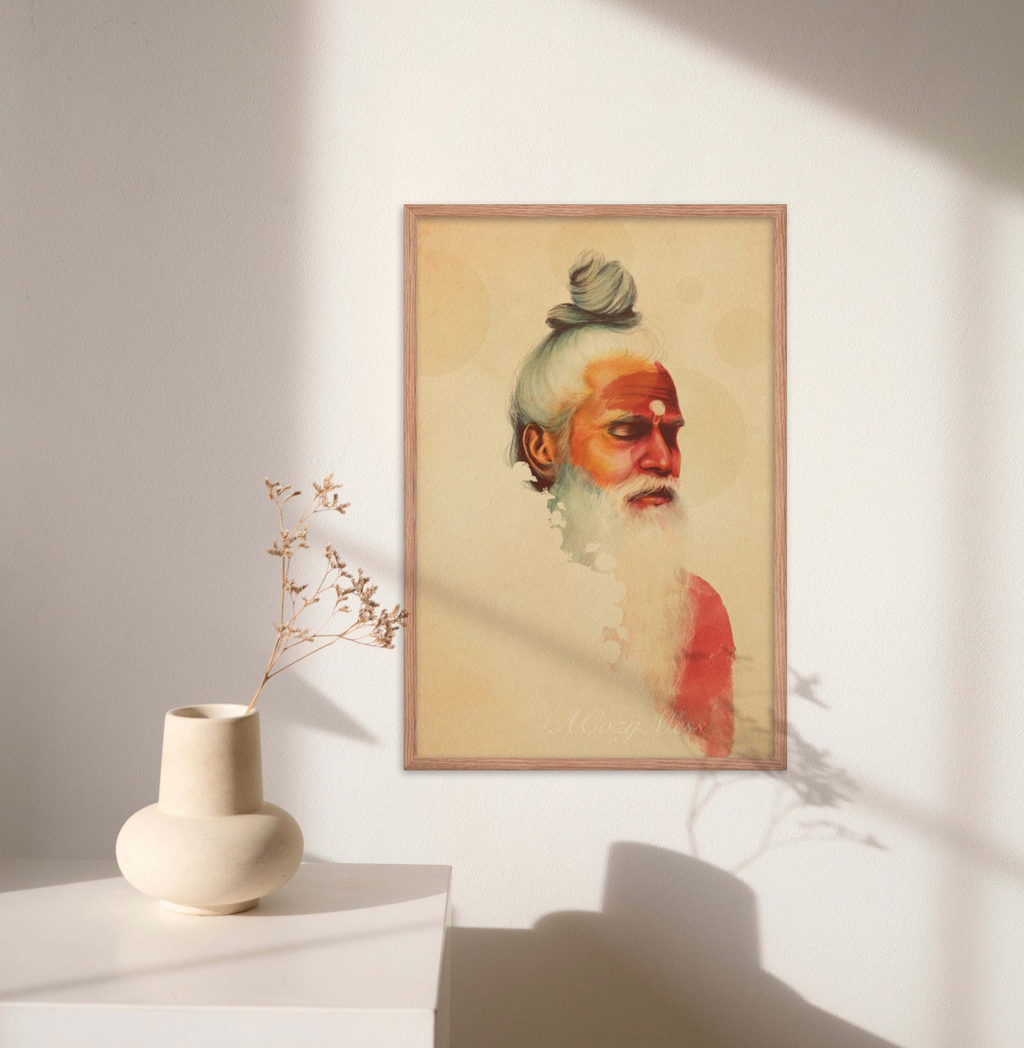 Indian holy man in meditation portrait in beige, orange & yellow palette, wall art in oak frame