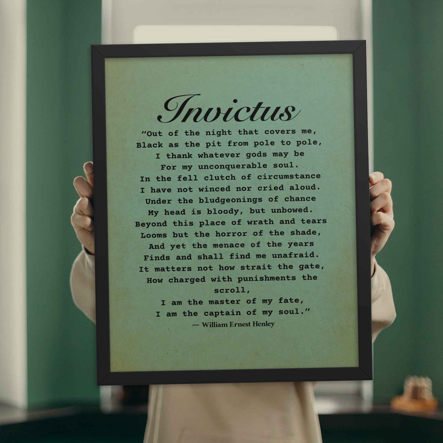 Invictus by William Ernest henley Poem Poster black on green displayed in oakwood frame.