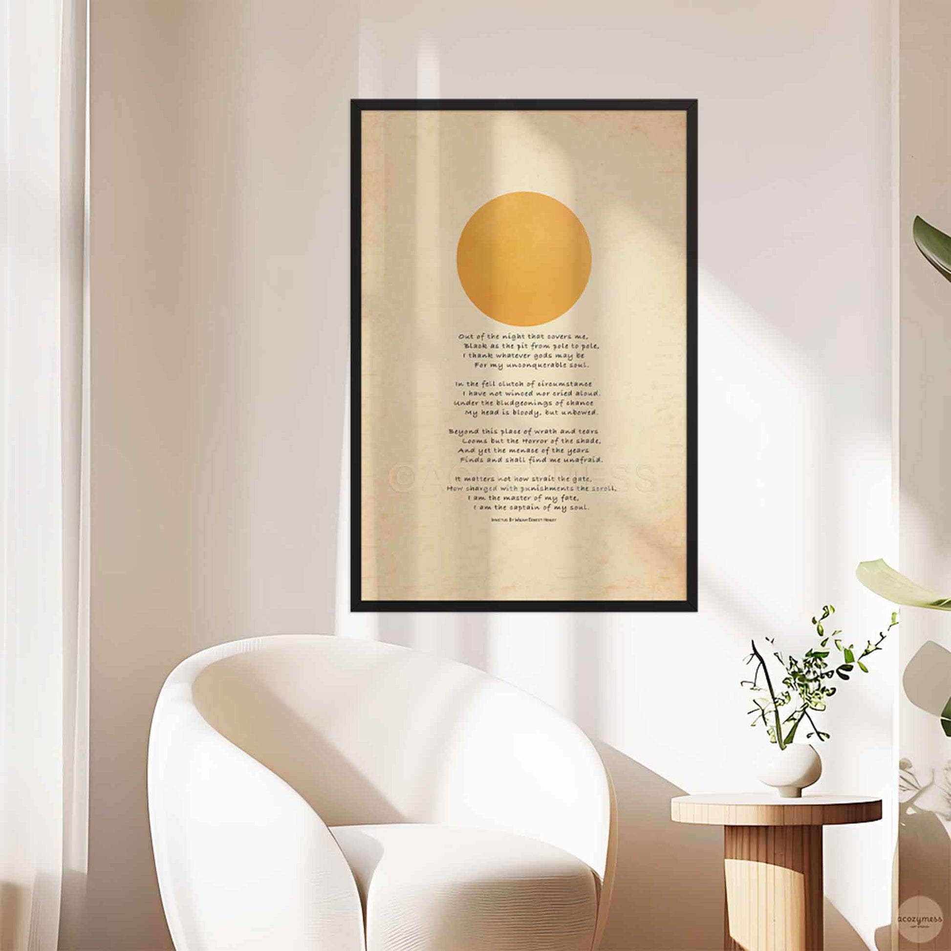 Invictus poem print with sun art shown in a black frame 