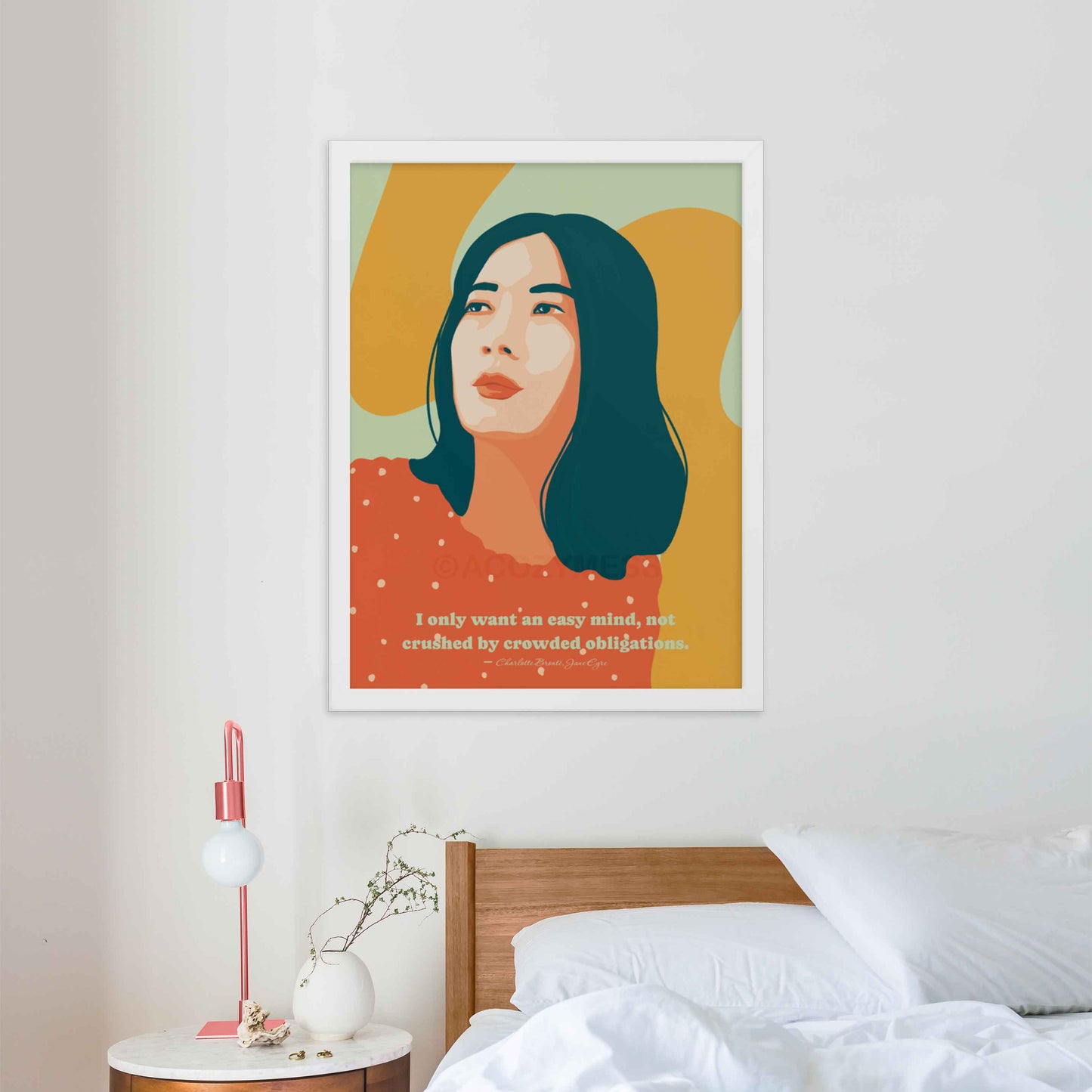 Vibrant and colorful art print of a woman, featuring a quote from Jane Eyre: 'I only want an easy mind, not crushed by crowded obligations,' in white frame having above bed