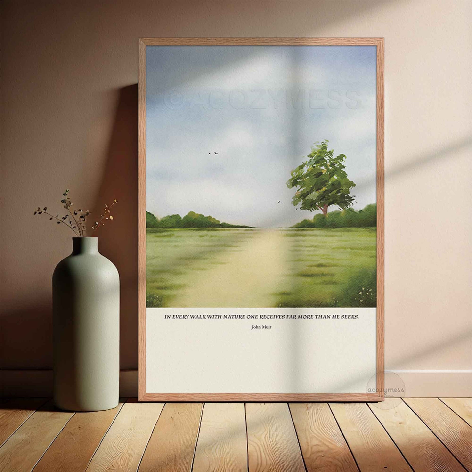 Oakwood framed poster featuring the John Muir quote “In every walk with nature one receives far more than he seeks,” with green landscape artwork.
