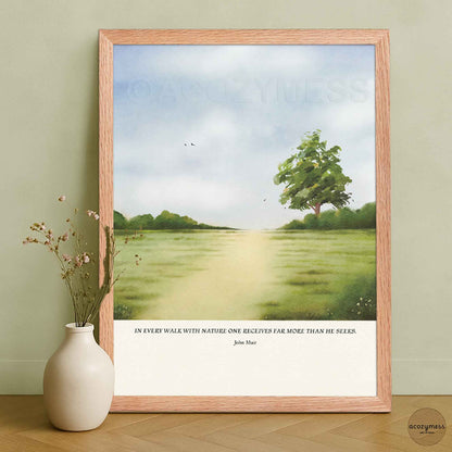Inspirational nature quote wall art by John Muir presented in an oakwood frame, featuring a peaceful green landscape illustration.