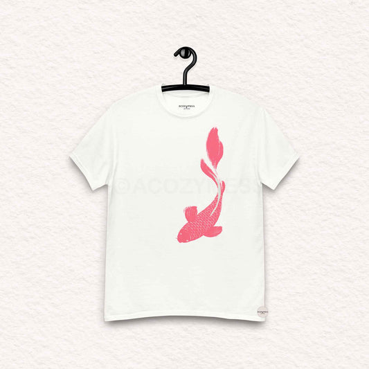 White t-shirt with pink fish design on a hanger against a white background