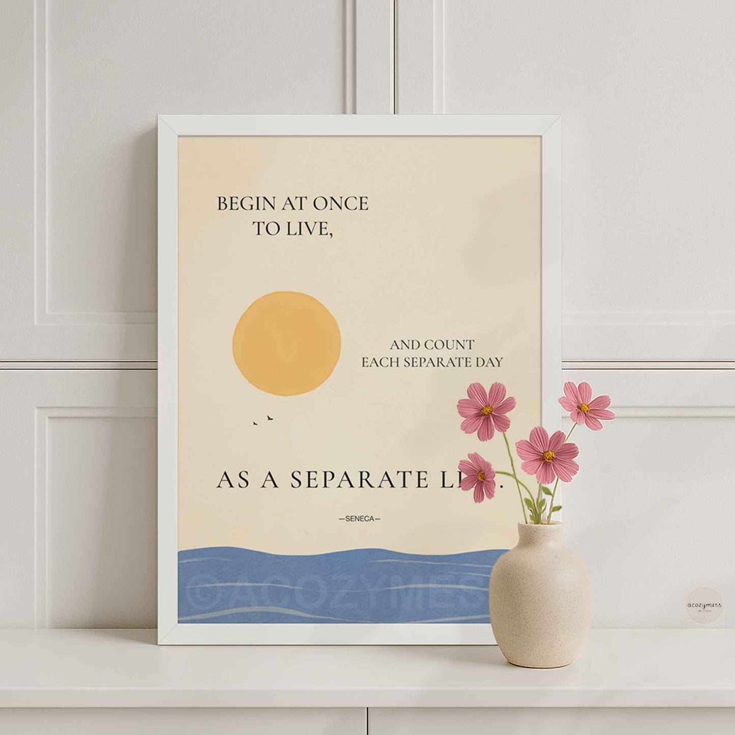 Minimalist Seneca poster in white frame featuring warm beige and ocean illustration