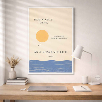 Seneca Stoic quote wall art in white frame on beige background with sun and sea on a wall above a desk.