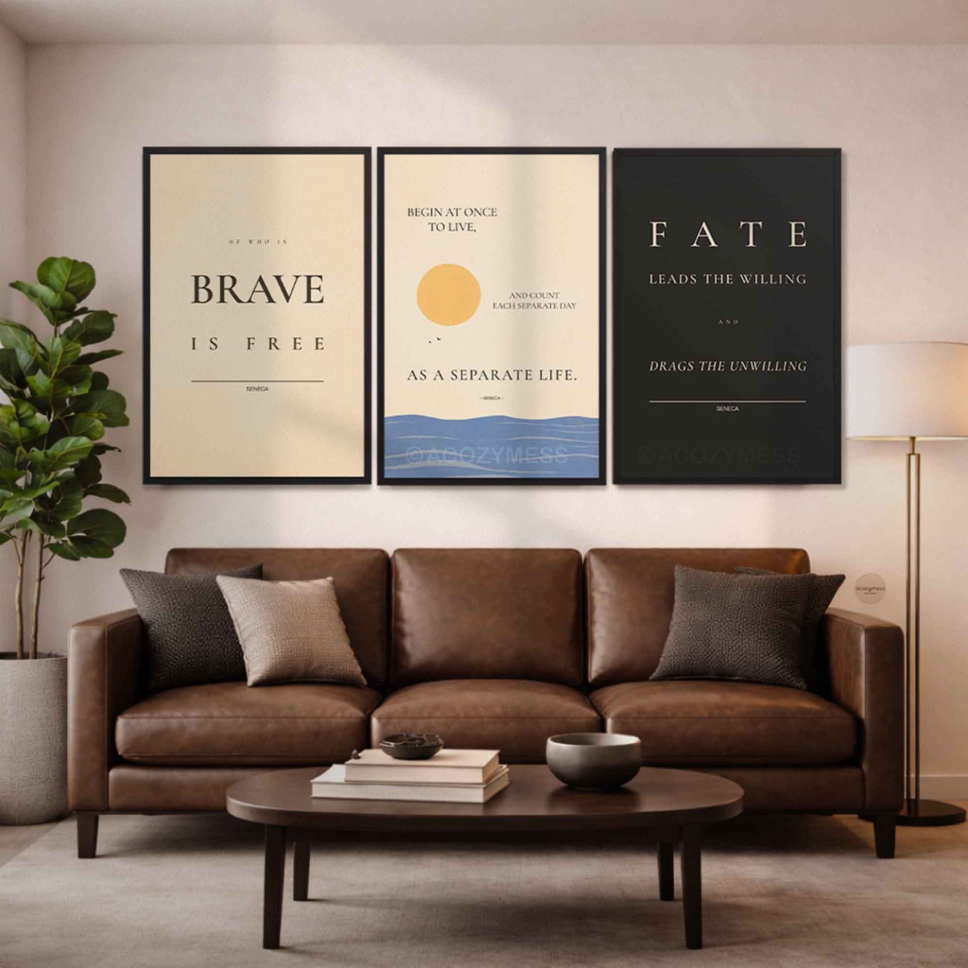 Living room with a brown sofa, coffee table, and motivational posters on the wall.