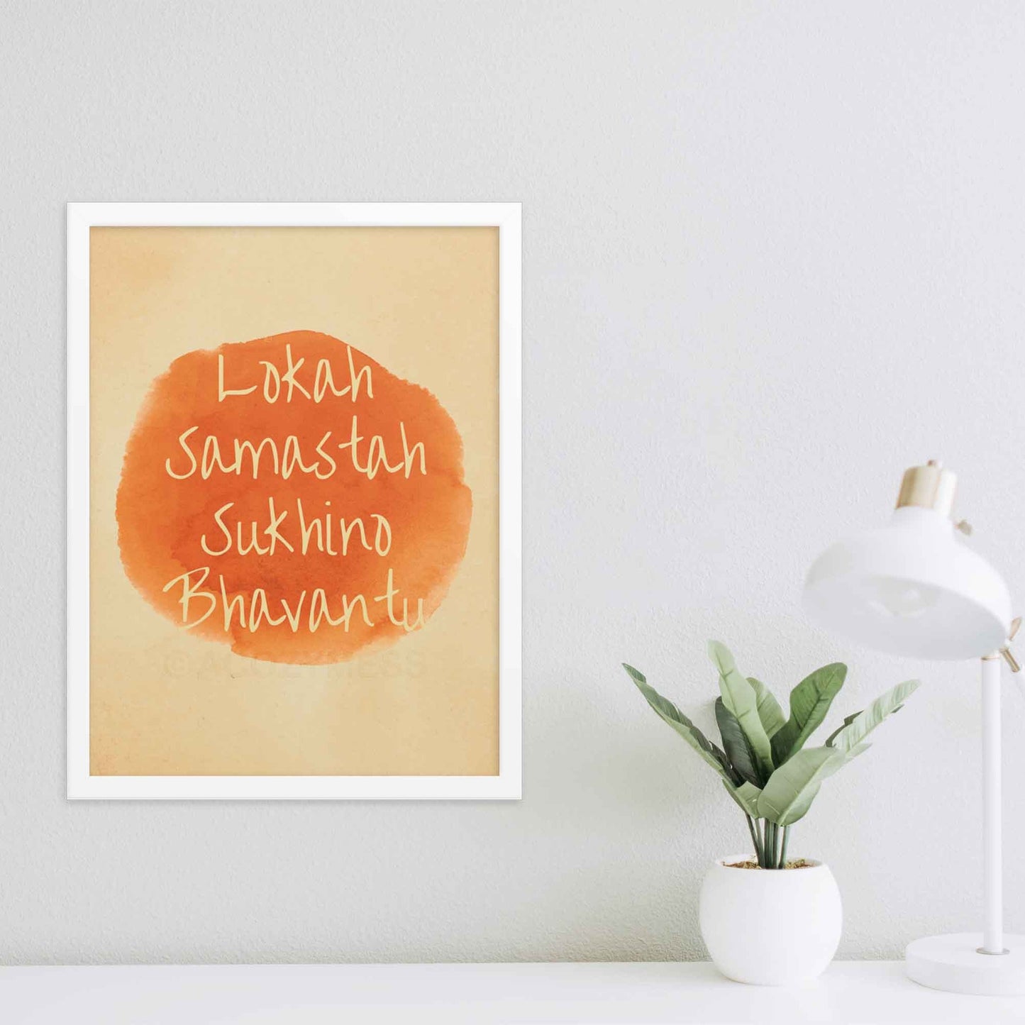 Art print featuring the mantra 'Lokah Samastah Sukhino Bhavantu,' created in watercolors and finished on iPad in orange and beige tones in white frame 18x24