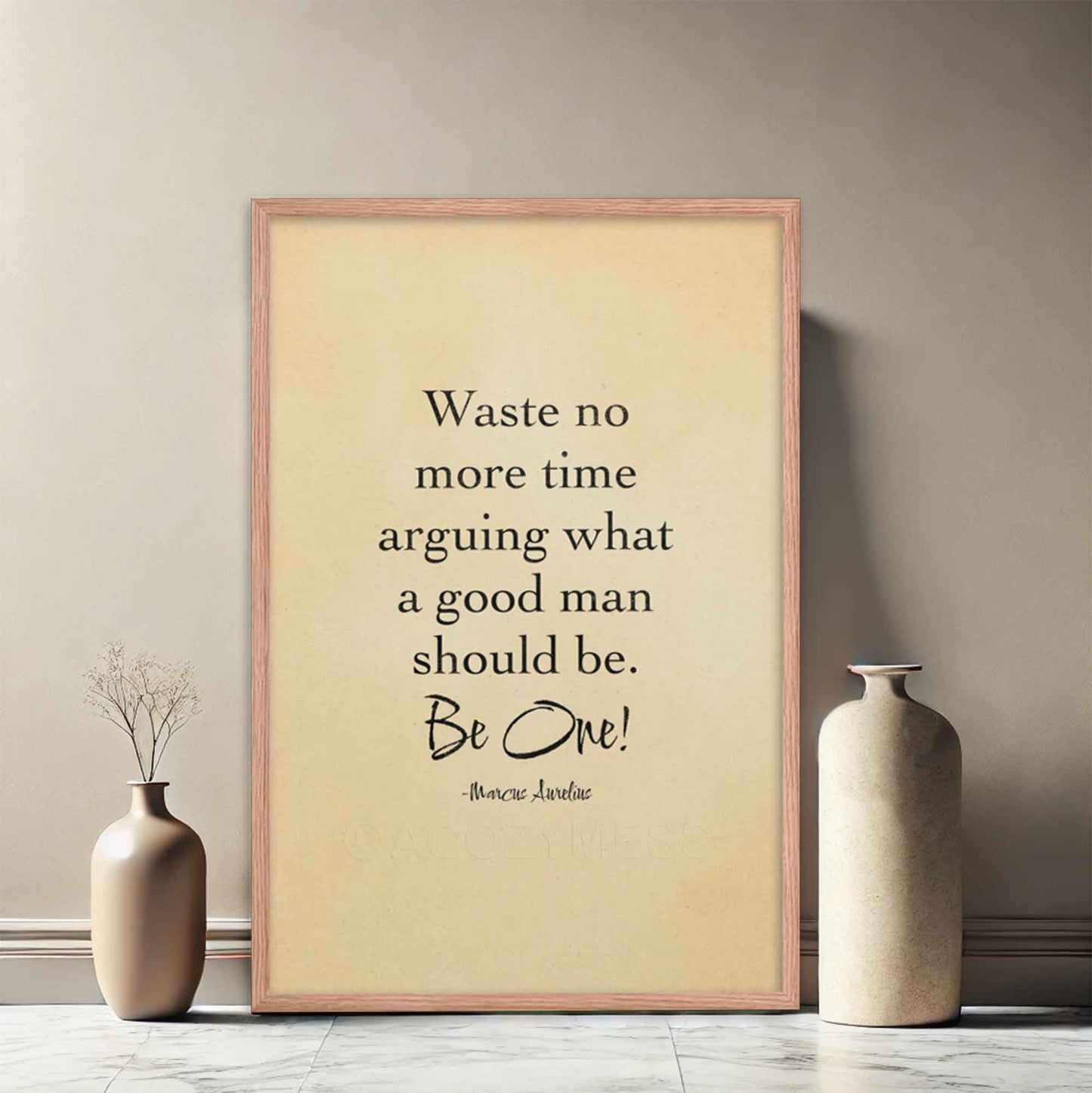 Black-on-beige literary poster featuring the quote by Marcus Aurelius, styled with an old paper look and displayed in a oakwood frame, adding a timeless and motivational touch to any space.