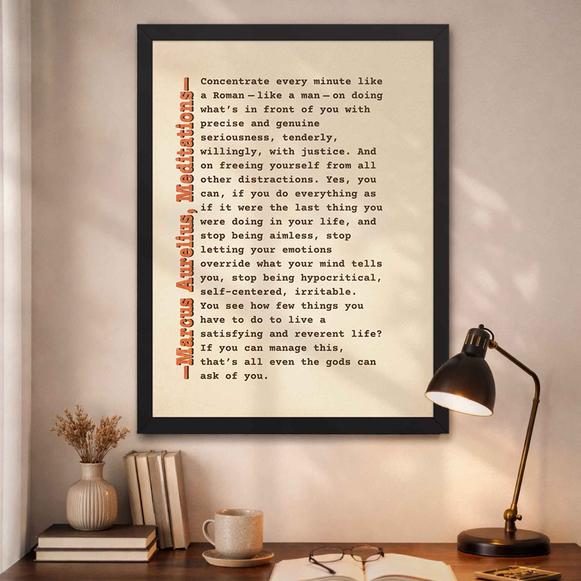 Marcus Aurelius quote poster in black frame with minimalist beige layout