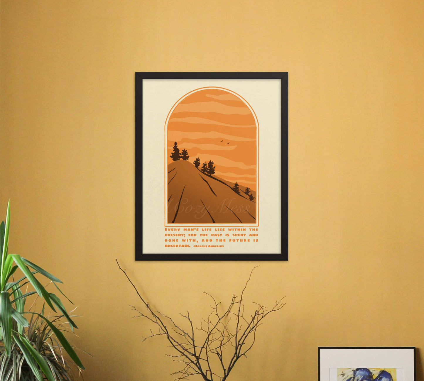 A tranquil landscape art poster framed in black, featuring a road and trees set against an orange sky. It's accentuated with a Marcus Aurelius quote on living in the present, designed to inspire mindfulness and serenity in any space.