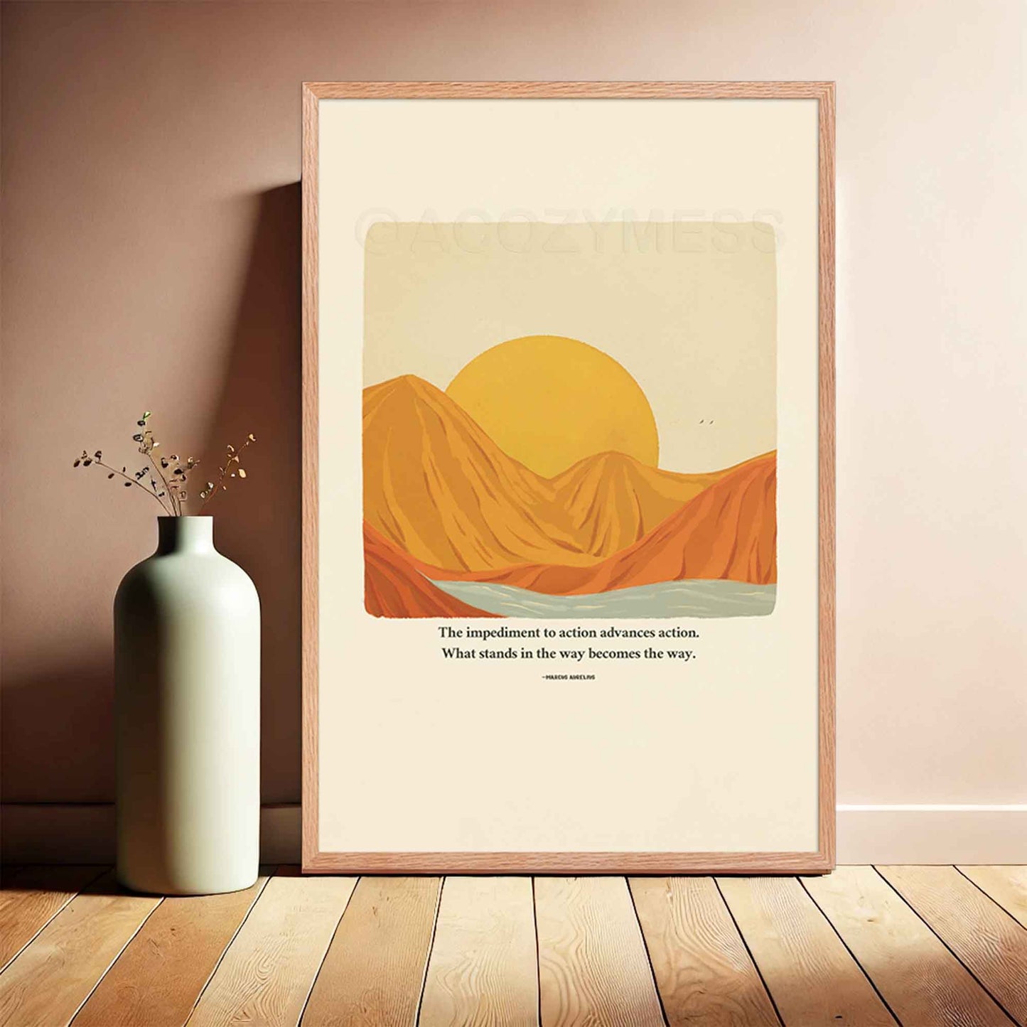 A motivational poster in oakwood frame featuring Marcus Aurelius' quote, "The impediment to action advances action. What stands in the way becomes the way," alongside a warm-toned nature illustration of a sun rising behind mountains with a flowing river. The design symbolizes resilience, overcoming obstacles, and finding strength in challenges, making it perfect for inspiring home or office decor.